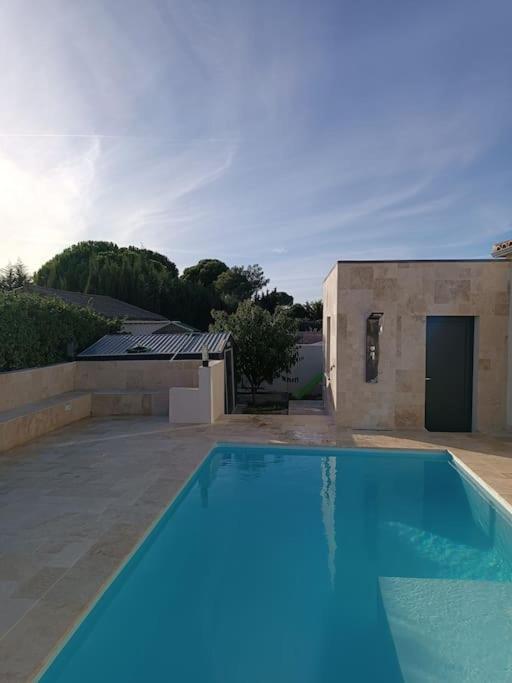 Charmant Studio Avec Piscine Villemoustaussou Exterior foto